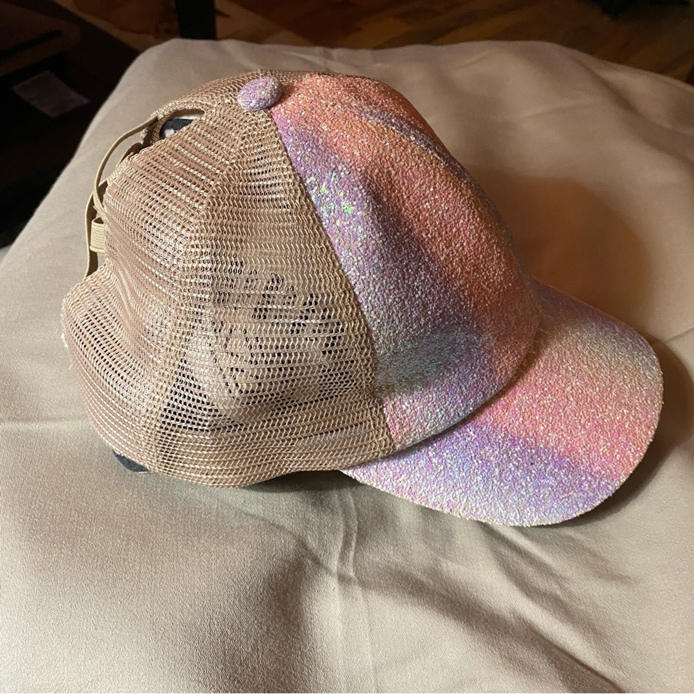 CC Criss cross pony tail cap. Pink purple glitter with tan back. EUC